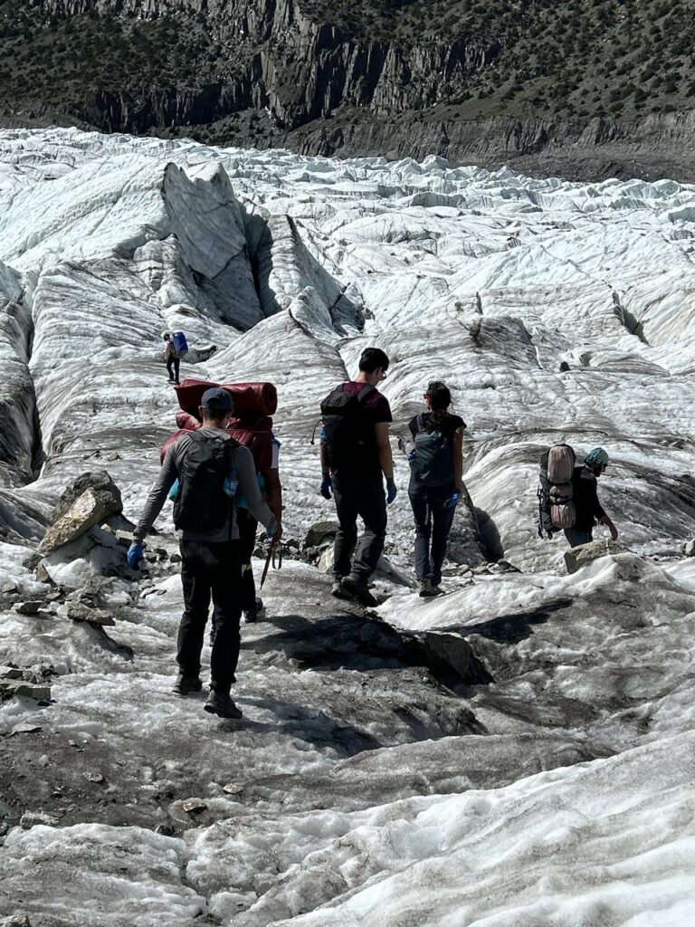 Hikers traversing patundas glacier