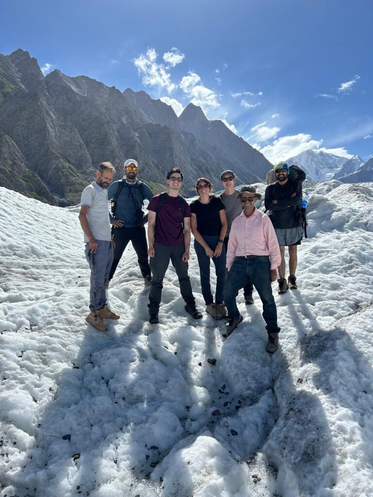 hikers standing on patundas glacier for picture